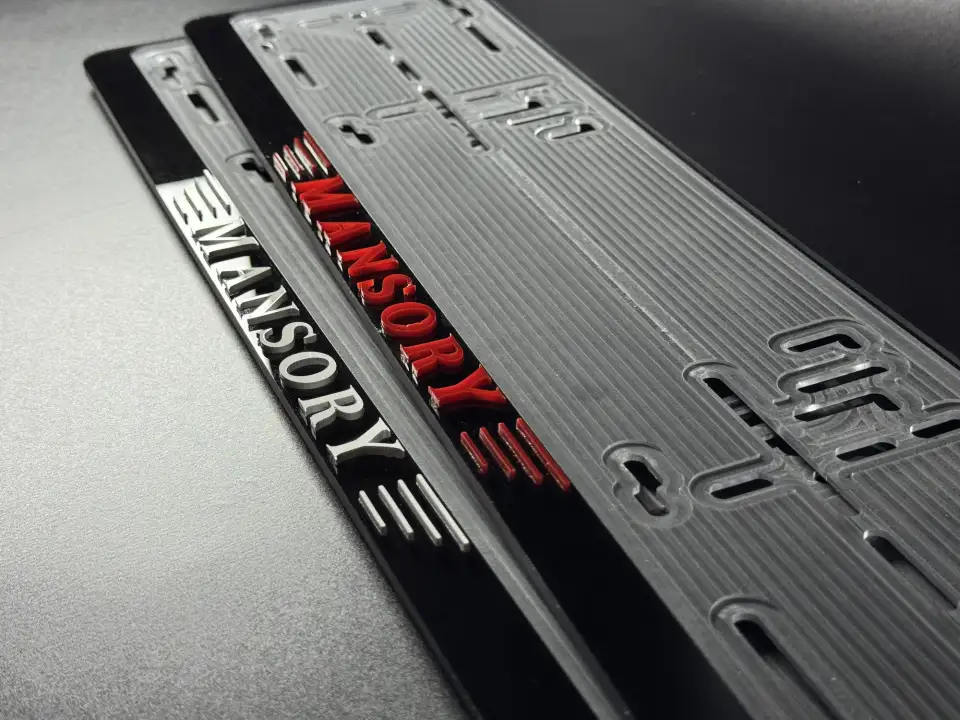 MANSORY · макро красных и белых букв Макро красных и белых букв MANSORY на чёрных номерных рамках